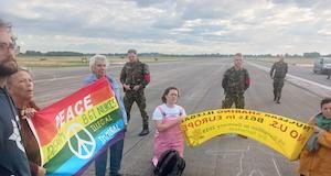 Climate action protest links nuclear war treat with climate crisis